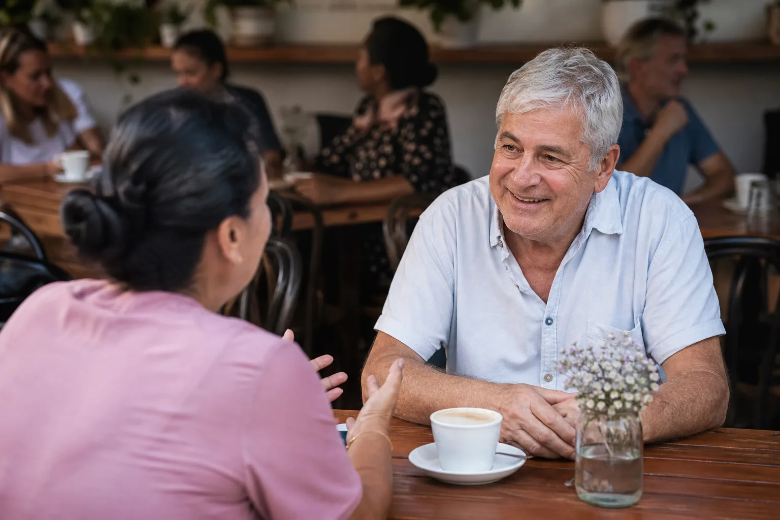 Widowed man having a relaxed conversation over coffee in Reading